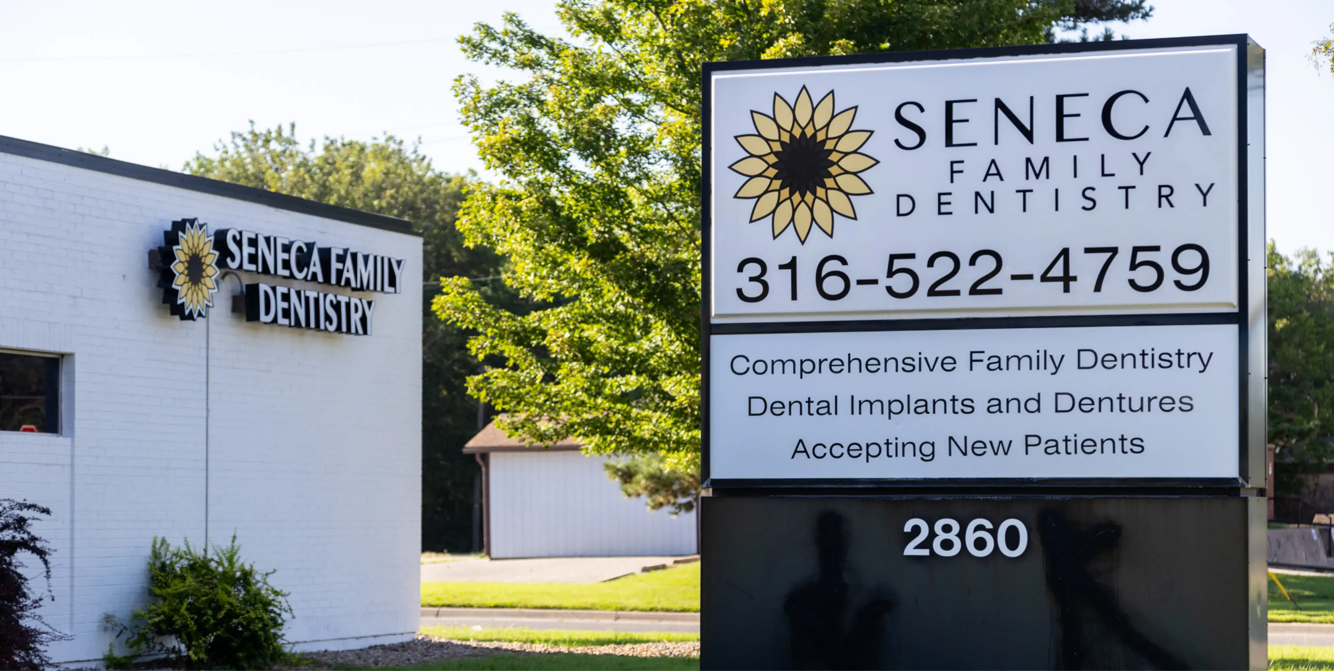 a sign outside of a dentist's office